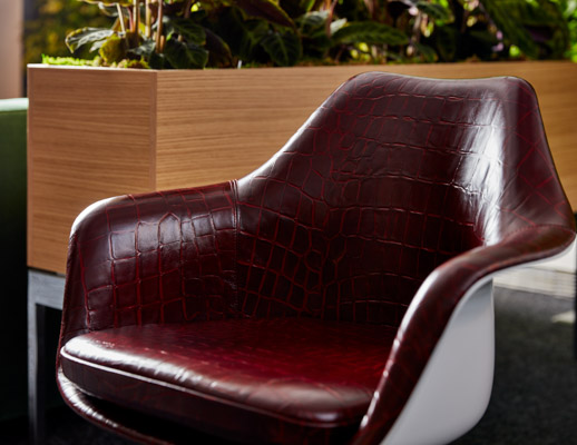 neocon 2018 hospitality at work tulip arm chair eero saarinen edelman leather crocodile