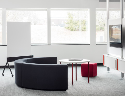 Knoll Interpole with grey k lounge and red Antenna Simple Table for Activity Spaces and other meeting spaces. 